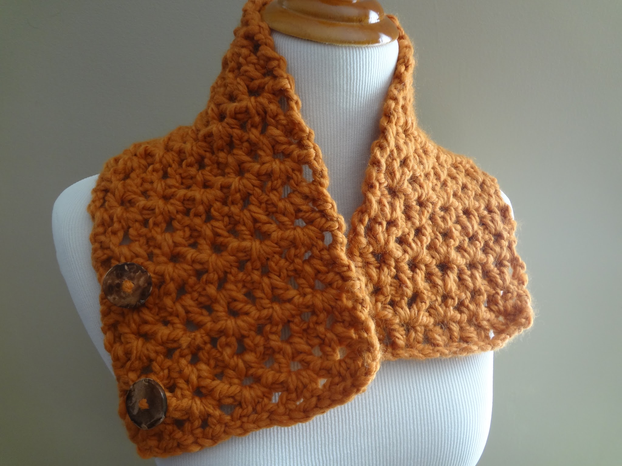 butternut squash neckwarmer free crochet pattern shown unbuttoned