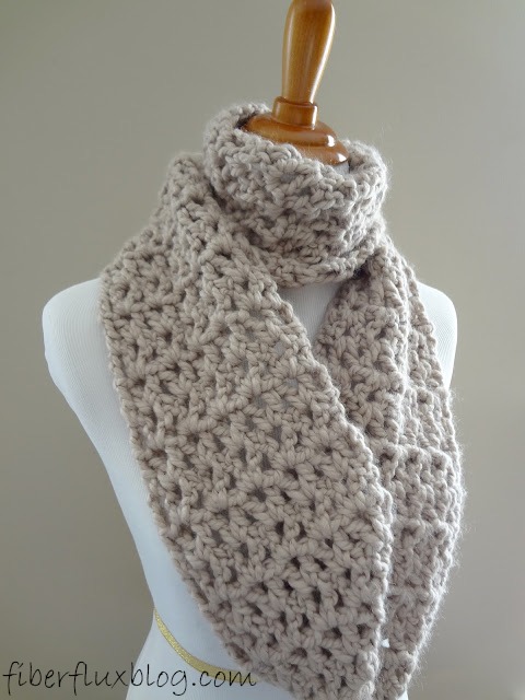pavement infinity scarf wrapped close to neck with a long loop hanging down
